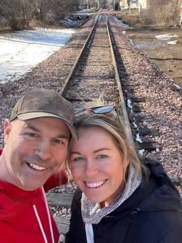 Lisa and Tony on railroad tracks