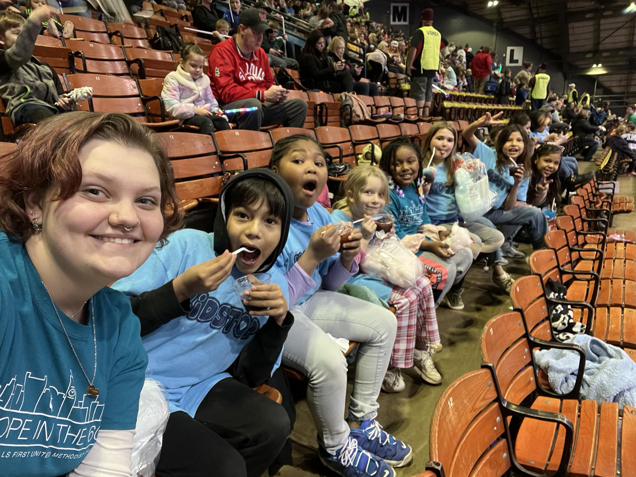 A group photo of Kidstop 4th and 5th graders at the Circus with teacher Harmony.