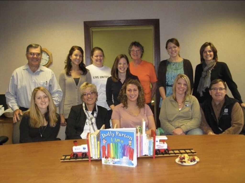 SEUW staff and volunteer Rich Gary celebrating 25 million Imagination Library books delivered.