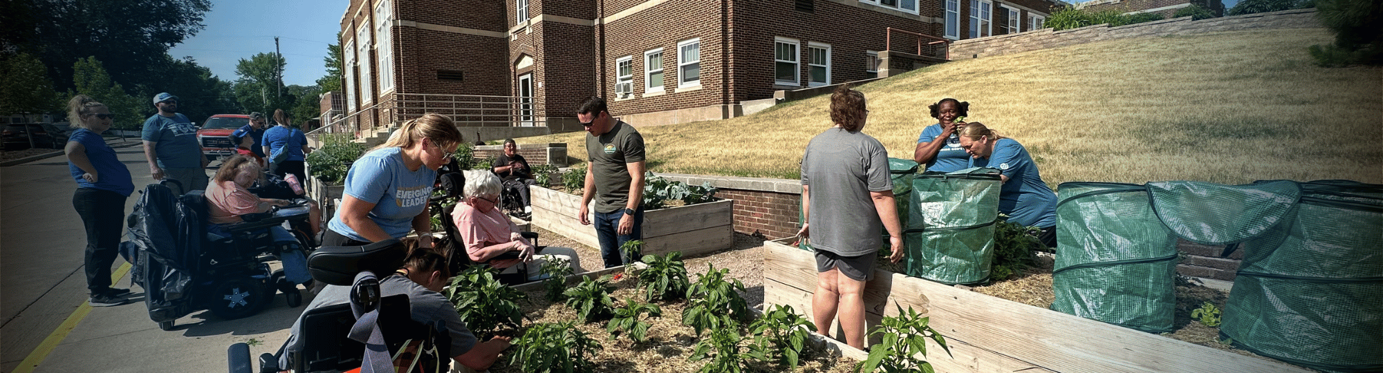 Volunteer United members gardening at DakotAbilities