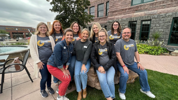 Sioux Empire United Way Staff Wearing Volunteer United Shirts in Washington Pavilion Sculpture Garden