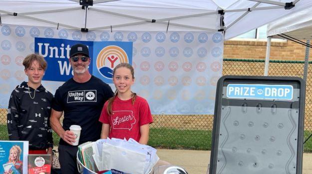 Tim Blotske shown with family and volunteering for SEUW